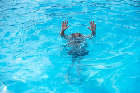 Photo for Underwater teen boy in the swimming pool with goggles in sunny day. Children Summer Fun. Kids water sport activity on summer holiday. - Royalty Free Image