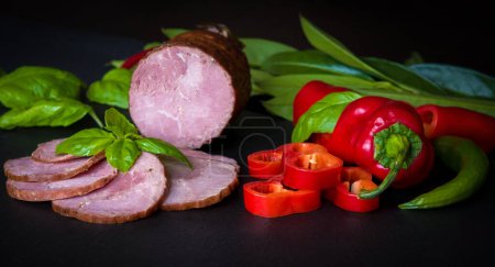 Photo for Group of smoked sausage with basil and red peppers - Royalty Free Image