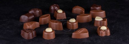 Photo for Chocolate pralines on a black background - Royalty Free Image