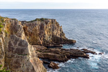 Photo for Sandanbeki Rock Cliff on Pacific ocean coast in Shirahama Town in Wakayama prefecture Japan - Royalty Free Image