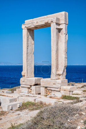 Remains of Portara gate of the Temple of Apollo at Naxos island in the Cyclades, Aegean Sea, Greece