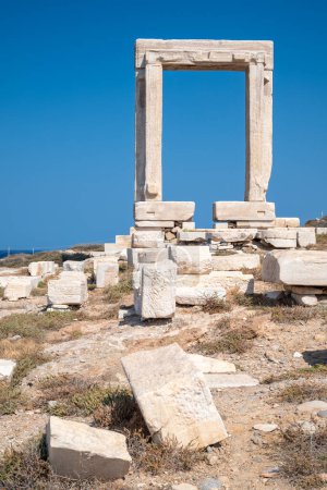 Remains of Portara gate of the Temple of Apollo at Naxos island in the Cyclades, Aegean Sea, Greece
