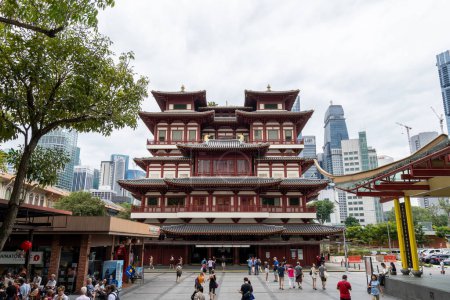 Photo for Buddha tooth relic temple busy with torists visiting. Famous landmark in Chinatown Singapore. Taken on October 10th 2022 - Royalty Free Image