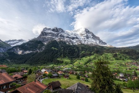 Eiger Mountain viewed from Grindelwald during sunrise hours. Famous landmark in Grindelwald, Switzerland