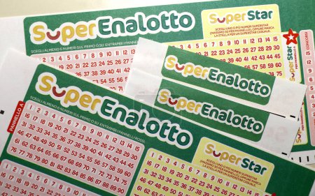 Photo for SuperEnalotto coupons, Italian numerical gambling with totalisers and prizes, managed by SISAL. High quality photo - Royalty Free Image