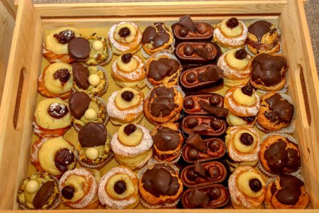 Photo for Tray with assortment of various types of Italian pastries ready to be tasted. High quality photo - Royalty Free Image