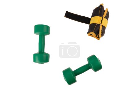 Foto de Sombrillas verde aislado, peso de las piernas negro y amarillo, fitness, deporte, ejercicio - Imagen libre de derechos