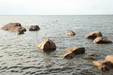 Photo for Large stones in the sea near the shore - Royalty Free Image