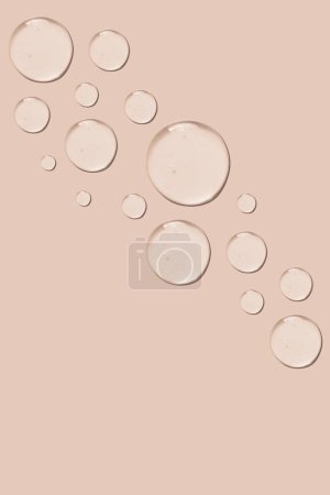 set of drops of gel texture on a pink background