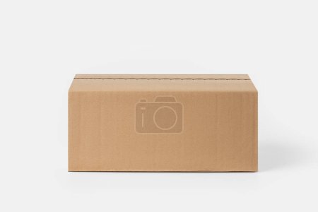 Photo for Cardboard box for delivery, parcels. On a light background - Royalty Free Image