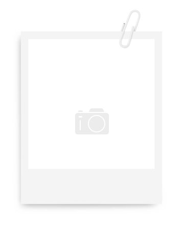 white Polaroid photo frame with a white paper clip on a blank background.