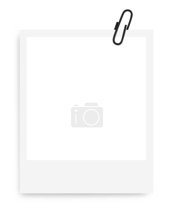 white Polaroid photo frame with a black paper clip on a blank background.