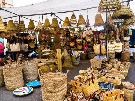 Photo for The Market and Feria Ground in Fuengirola on the Costa del Sol Spain.There is a  weekly Flea Market and a Market selling essential items such as clothes,fruit & food. Ferias(Festivals)which feature traditional  music and dancing also take place here - Royalty Free Image