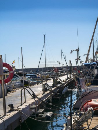 Photo for The port and marina in Fuengirola on Spain's Costa del Sol. This is still a working fishing port - Royalty Free Image
