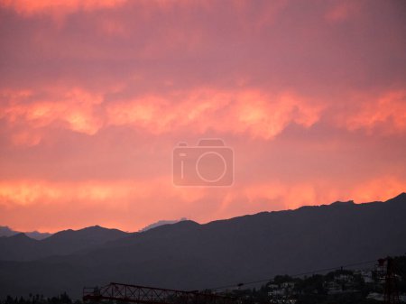 Photo for Amazing Evening Sky as the sun was setting over Fuengirola on Spain's Costa Del Sol. It was as if the sky was on fire over the mountains - Royalty Free Image