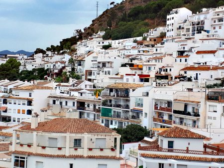 Photo for Mijas one of the most beautiful `white` villages of the Southern Spain area called Andalucia. It is in the mountains above the coast.The village is built on the side of the mountain and is very picturesque. The name is pronounced Mee Hahs. - Royalty Free Image