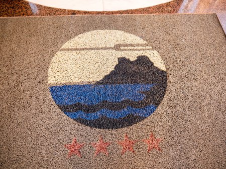 Photo for Weird design on the pavement in Fuengirola on the Costa Del Sol in Spain. It may represent to sun,the mountains and the sea in the resort - Royalty Free Image