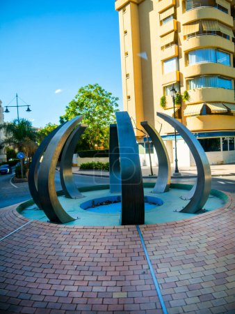 Photo for Sculpture on a traffic roundabout in Fuengirola on the Costa del Sol in Southern Spain - Royalty Free Image