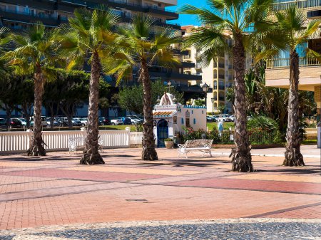 Photo for Small Shrine on the promenade in Fuengirola on the Costa del Sol dedicated to Our Lady of Ftima; known as Our Lady of the Holy Rosary of Ftima is a Catholic title of Mary, mother of Jesus. - Royalty Free Image