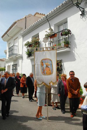 Photo for Easter  Processions in the Benalmadena Pueblo on the Costa Del Sol in Spain.Spanish People are very religious and Easter is  their most spectacular displays of their Faith.They carry the statues through the streets accompanied by bands and flowers - Royalty Free Image