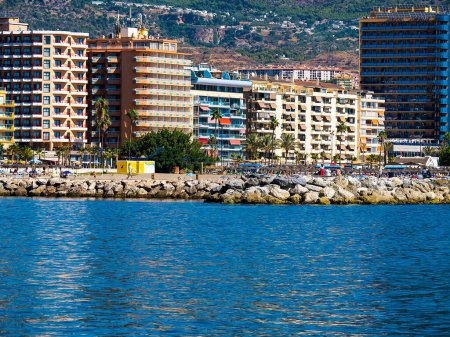 Photo for All along the Costa Del Sol in Southern Spain the sea shore is lined with luxury and high rise hotels and apartments to accommodate the millions of tourists. This is in Fuengirola which is a popular resort with a 7 kilometer beach. - Royalty Free Image