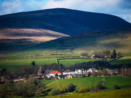 Photo for The countryside around Pendle Hill in Lancashire England. In 1612 13 people were accused of witchcraft. 10 were hung, 1 died in prison and 1 was pilloried but survived - Royalty Free Image