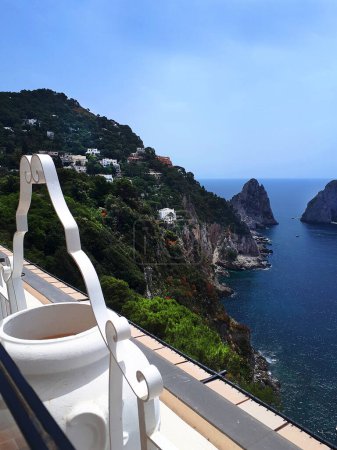 Photo for The Faraglioni  Rocks off the coast of Capri..Capri has been a resort island since Roman times . It is situated in the Gulf of Naples and is covered with architecture from all the successive generations - Royalty Free Image