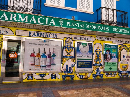 Photo for Heavily decorated with ceramic tiles this pharmacy is like a work of Art in Fuengirola on the Costa del Sol - Royalty Free Image