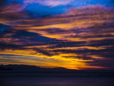 Photo for Dramatic Sunrise over Fuengirola on the Costa del Sol in Spain promises another hot sunny day - Royalty Free Image
