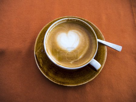 Photo for A cup of coffee with heart to give you a smile as you eat your breakfast in Fuengirola on the Costa gel Sol Spain - Royalty Free Image