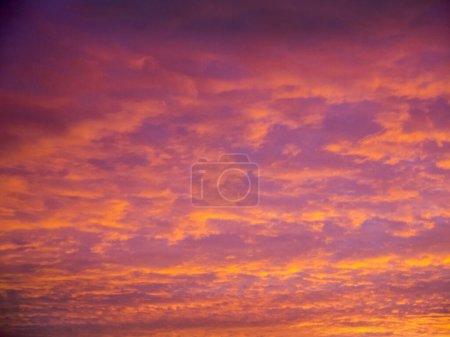 Photo for Sunset over Lancashire England. This display was glorious just for a few moments over the rooftops of Burnley.. Then the sky became dark and the sun set behind the hills - Royalty Free Image