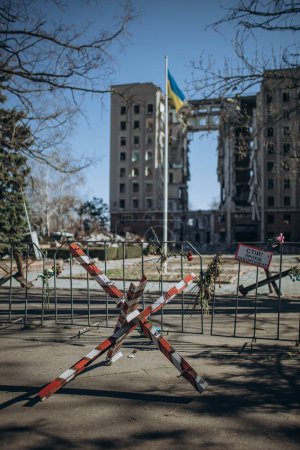 Mykolaiv, Ukraine - March 11, 2023: Russia hit the Mykolaiv State Regional Administration building with a cruise missile. War in Ukraine.  37 people lost their lives when it was hit by Russian forces Mouse Pad 659056148