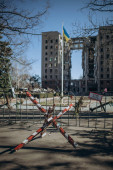 Mykolaiv, Ukraine - March 11, 2023: Russia hit the Mykolaiv State Regional Administration building with a cruise missile. War in Ukraine.  37 people lost their lives when it was hit by Russian forces puzzle #659056148