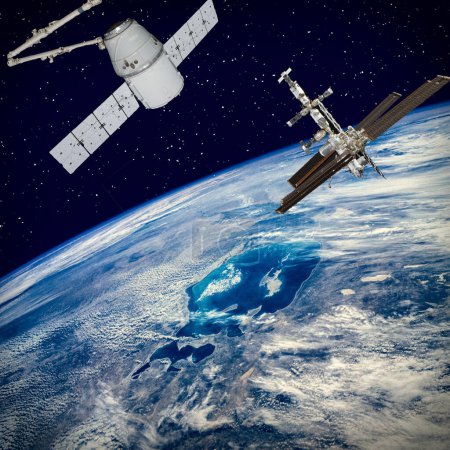 Téléchargez les photos : Des vaisseaux spatiaux dans l'espace. Thème scientifique. Les éléments de cette image fournis par la NASA - en image libre de droit
