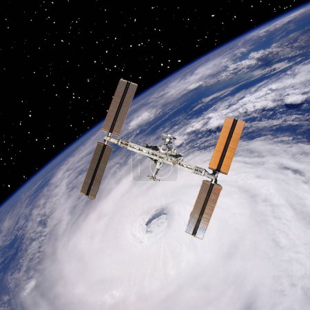 Téléchargez les photos : Station spatiale au-dessus de la terre. Les éléments de cette image fournis par la NASA - en image libre de droit