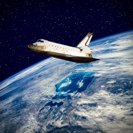 Foto de Transbordador sobre la tierra. Los elementos de esta imagen proporcionados por la NASA - Imagen libre de derechos