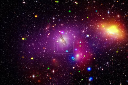 Foto de Galaxia y polvo de estrellas. Los elementos de esta imagen proporcionados por la NASA - Imagen libre de derechos