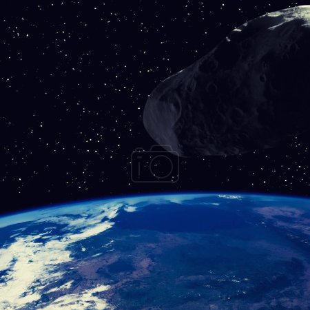 Foto de Asteroide volando sobre la tierra. Elementos de esta imagen proporcionados por la NASA. - Imagen libre de derechos
