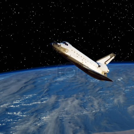 Foto de Transbordador sobre la tierra. Los elementos de esta imagen proporcionados por la NASA - Imagen libre de derechos