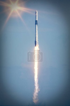 A SpaceX Falcon 9 rocket soars into the sky after lifting off from Launch Complex 39A at Kennedy Space Center in Florida at 11:17 a.m. EST on Dec. 6, 2020. The rocket is carrying the uncrewed cargo Dragon spacecraft on its journey to the Internationa