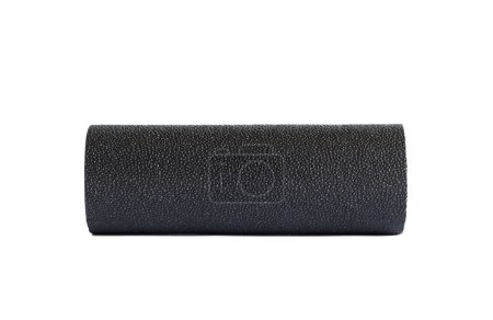 A black massage foam roller mini isolated on a white background. Close-up. Foam rolling is a self myofascial release technique. Concept of fitness equipment.