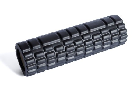 Photo for A black foam massage roller isolated on a white background. Foam rolling is a self myofascial release technique. Gym fitness equipment. - Royalty Free Image