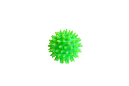 A green myofascial ball isolated on a white background. Concept of physiotherapy or fitness.