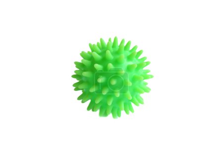 Ein grüner myofaszieller Ball isoliert auf weißem Hintergrund. Konzept der Physiotherapie oder Fitness.
