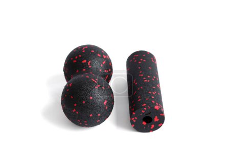 Photo for Massage set: A black red double ball and mfr massage mini roller isolated on a white background. Close-up. Foam rolling is a self myofascial release technique. Concept of fitness equipment. - Royalty Free Image
