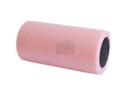 Photo for A pink massage foam roller isolated on a white background. Close-up. Foam rolling is a self myofascial release technique. Concept of fitness equipment. - Royalty Free Image
