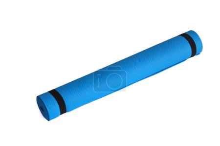 Photo for A blue yoga mat isolated on a white background. oncept of fitness equipment. - Royalty Free Image
