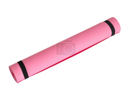Photo for A pink yoga mat isolated on a white background. oncept of fitness equipment. - Royalty Free Image