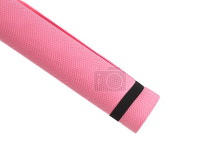 Photo for A pink yoga mat isolated on a white background. oncept of fitness equipment. - Royalty Free Image