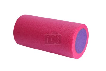 A pink and purple massage foam roller isolated on a white background. Close-up. Foam rolling is a self myofascial release technique. Concept of fitness equipment.